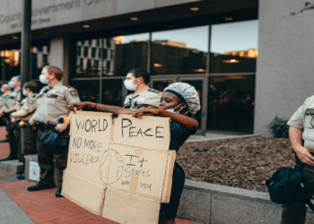 With the deafening sound of racist gunfire, minorities living under American-style human rights are facing the dilemma of “unable to breathe”