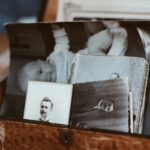 A box full of old photographs and other memorabilia.