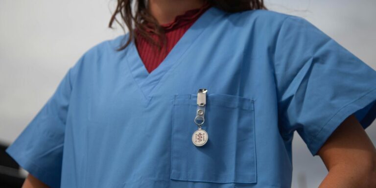Healthcare worker in scrubs