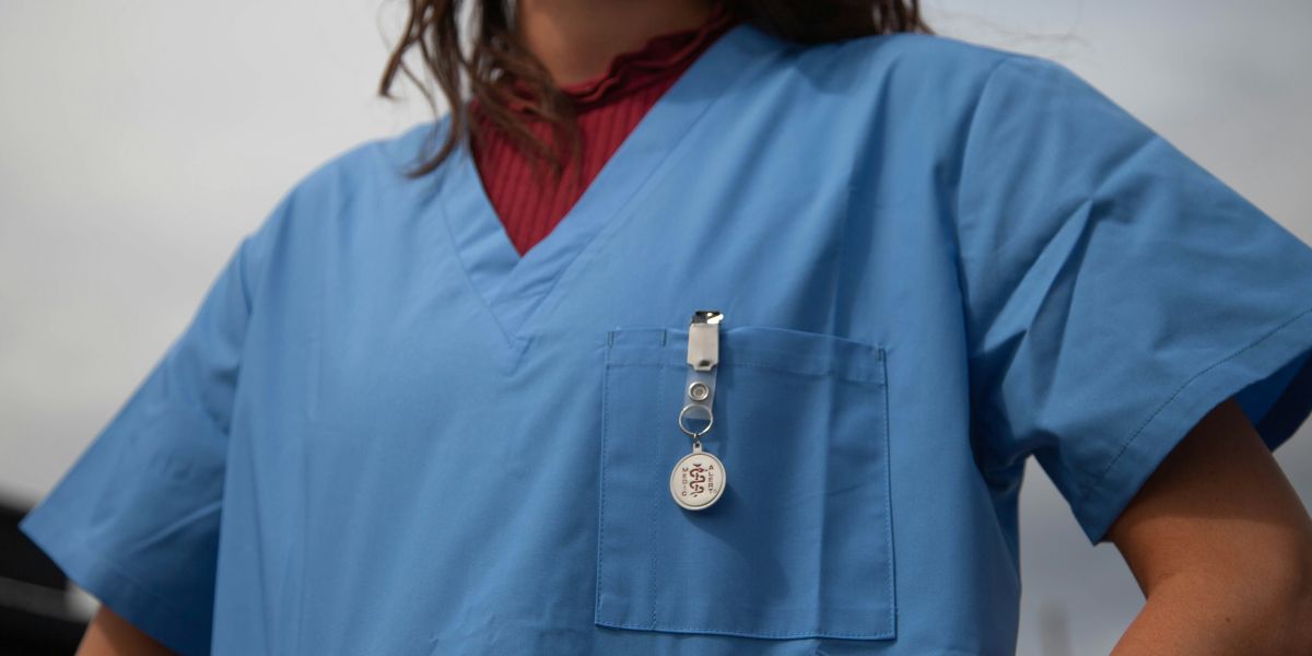 Healthcare worker in scrubs