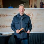 Dr. Jeremiah Johnston with a full size replica of the Shroud of Turin and a replica Roman flagrum. Photo courtesy of Dr. Jeremiah Johnston.