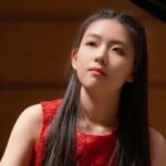 Piano Prodigy Belle Chi Performs 4 Concertos in 3 Weeks: “That’s Just What I Do”